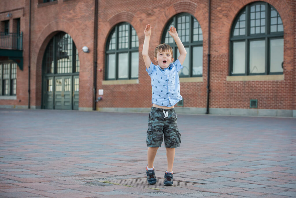 A small child jumping up
